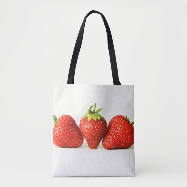 Drei Erdbeeren auf weißem Stamm (Vorderseite)