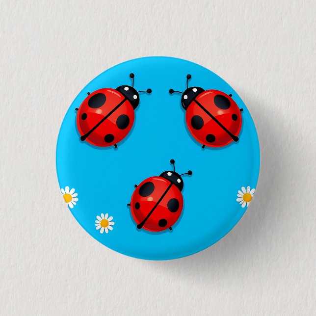 Drei farbenfrohe Ladybugs auf blauem Hintergrund Button (Vorderseite)