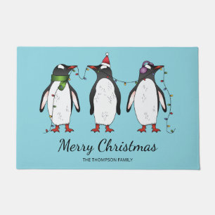 Drei festliche Weihnachtspinguine mit individuelle Fußmatte