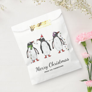 Drei festliche Weihnachtspinguine mit individuelle Geschenktütchen