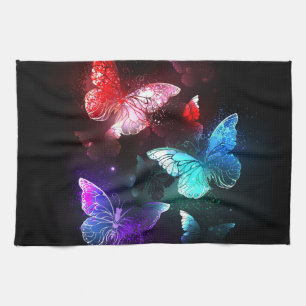 Drei glühende Schmetterlinge im Hintergrund Geschirrtuch