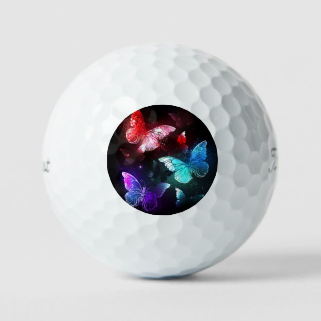 Drei glühende Schmetterlinge im Hintergrund Golfball (Vorderseite)