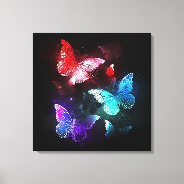 Drei glühende Schmetterlinge im Hintergrund Leinwanddruck (Vorderseite)