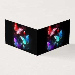 Drei glühende Schmetterlinge im Hintergrund Visitenkarten