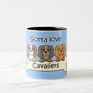 Drei Kavalier-König Charles Spaniels Zweifarbige Tasse