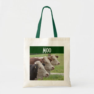 Drei Kühe in einer Tasche