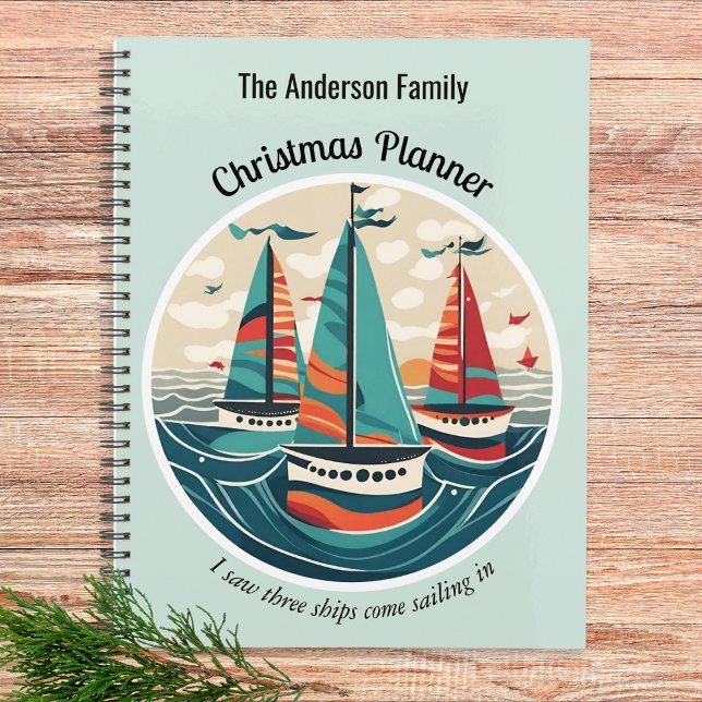 Drei Schiffe Festivals Nautic Stilvolle Weihnachte Planer (A spiral-bound Christmas planner with 'I Saw Three Ships' design in turquoise and orange colors)