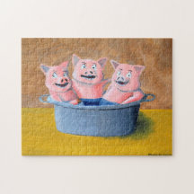 Drei Schweine in einer Wanne