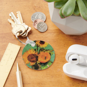 Drei Sonnenblumen in einer Vase von Vincent van Go Schlüsselanhänger