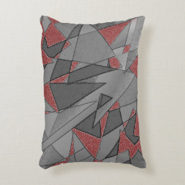 Dreieckige raue Ausschnitte über rotem Hintergrund Dekokissen