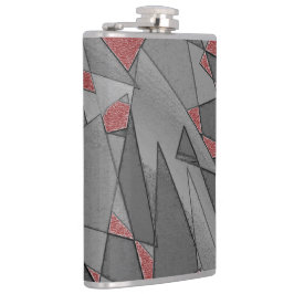 Dreieckige raue Ausschnitte über rotem Hintergrund Flachmann