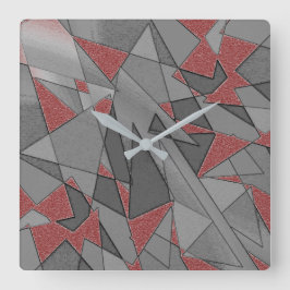 Dreieckige raue Ausschnitte über rotem Hintergrund Quadratische Wanduhr
