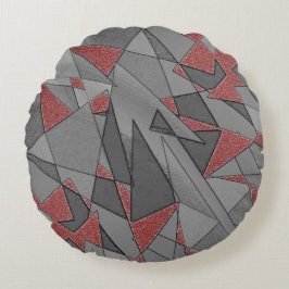 Dreieckige raue Ausschnitte über rotem Hintergrund Rundes Kissen