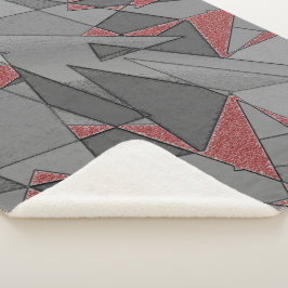 Dreieckige raue Ausschnitte über rotem Hintergrund Sherpadecke