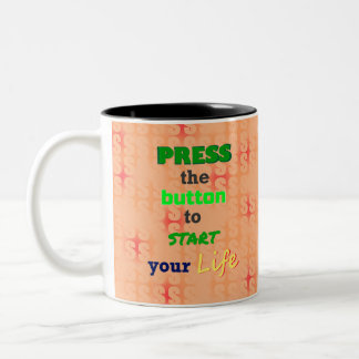 Drücken Sie die grüne Taste. Zweifarbige Tasse