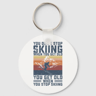 Du hörst nicht auf zu skifahren, wenn du ein alter schlüsselanhänger