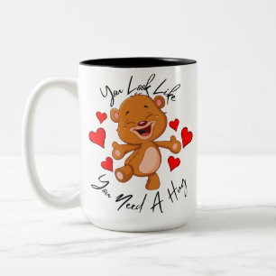 Du siehst aus, als hättest du ein dickes Teddybä Zweifarbige Tasse