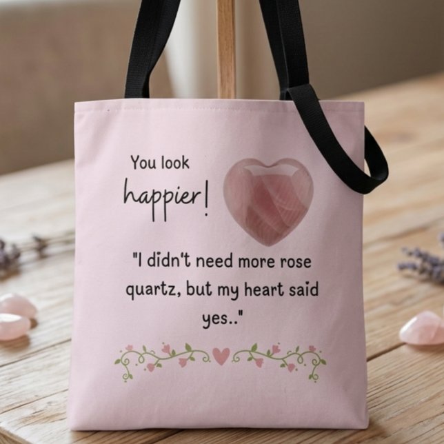 Du siehst glücklicher aus! Ich brauchte keinen wei (You look happier! "I didn't need more rose quartz, but my heart said yes." tote bag)