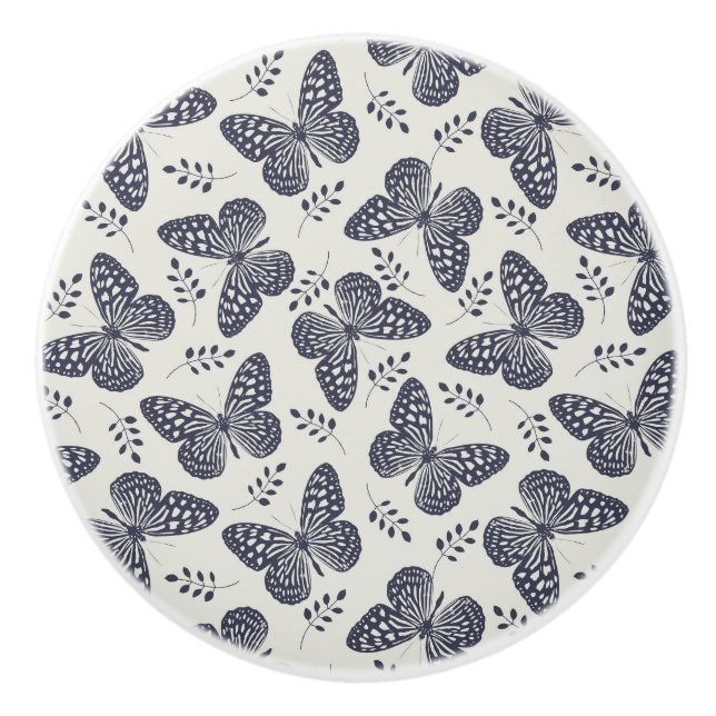 Dunkelblaues Schmetterlingsmuster auf grauem Hinte Keramikknauf (Vorderseite)