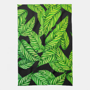 dunkelgrüne Blätter auf schwarz Geschirrtuch