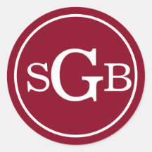 Dunkelrotes Kreislauf Traditionelles Monogramm