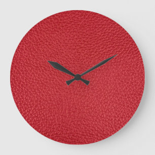 Dunkelrotes künstliches Kunstleder Nahaufnahme. Große Wanduhr
