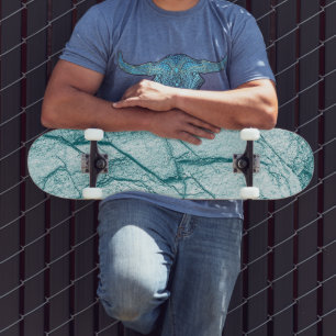 Dunkeltürkisfarbener Marmorlook Skateboard