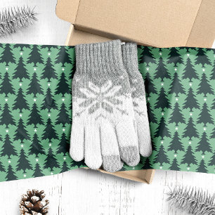Dunkle grüne Weihnachtsbäume auf Grün Seidenpapier