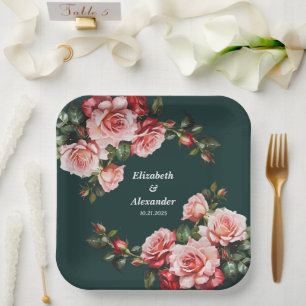 Dunkle, stimmungsvolle rosa und rote Rosen grüne H Pappteller