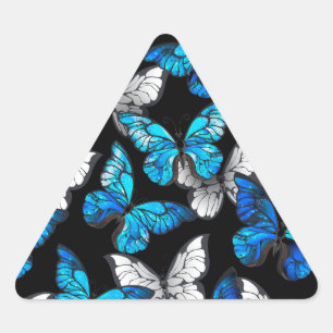 Dunkles Nahtloses Muster mit blauen Schmetterlinge Dreieckiger Aufkleber