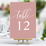 Dusty Rose Rosa Minimalistische Kalligrafie Hochze Tischnummer<br><div class="desc">Freuen Sie sich auf die elegante Atmosphäre Ihres Hochzeitsempfängers. Diese minimalistischen Tischnummern enthalten ein Single,  "Table",  in einem zarten Kalligraphieskript auf einem beruhigenden,  staubigen Rose rosa Hintergrund. Das schlichte und dennoch raffinierte Design verleiht Ihrem Tisch eine Touch von Eleganz und verleiht Ihrem Ambiente ein angenehmes Ambiente.</div>