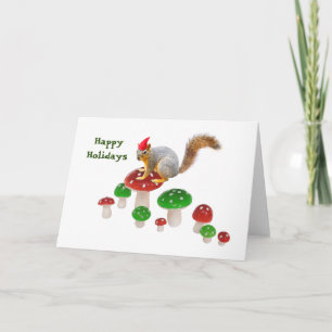 Eichhörnchen mit roter und grüner Pilzkarte Feiertagskarte