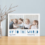 Eier für die Welt | 2 Foto Hanukkah Feiertagskarte<br><div class="desc">Whimsical Hanukkah Foto-Karte verfügt über zwei Ihrer Lieblings-Fotos in einem quadratischen Format nebeneinander ausgerichtet. "Oy to the World" erscheint unterhalb in blauen, ausgeschnittenen Buchstaben. Personalisieren Sie Ihren Familiennamen oder Namen, Ihre persönliche Begrüßung und das Jahr am unteren Ende. Eine lustige und moderne Hanukkah-Karte, die Ihren Urlaubsmailings eine leichte Freude bereiten...</div>
