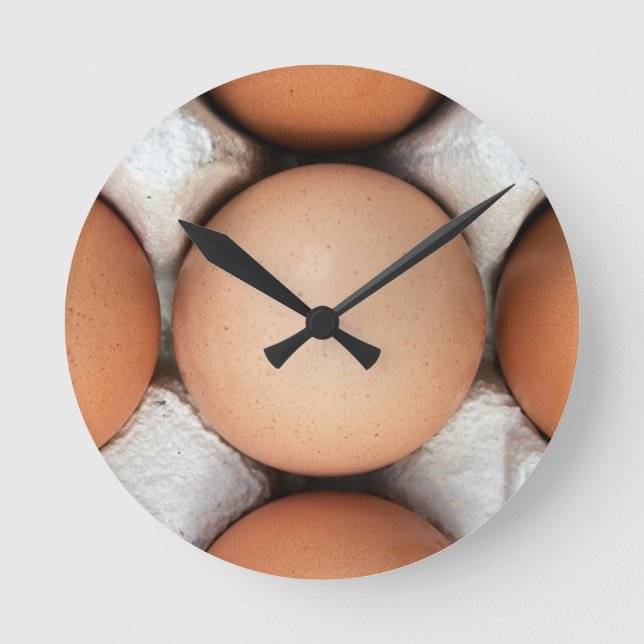 Eier in einer Schachtel Runde Wanduhr (Vorderseite)
