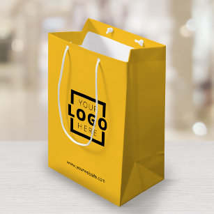 Eigene Werbung für gelbes Shopping-Logo Mittlere Geschenktüte