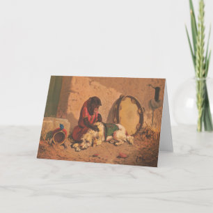 Ein Affe und ein Hund mit einem großen Tambourin Karte