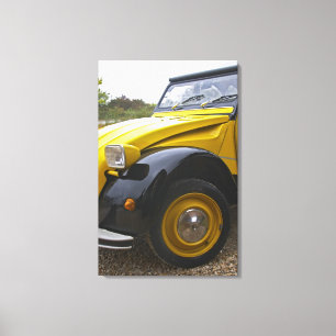 Ein alter schwarzer und gelber Citroen 2CV 2 CV, Leinwanddruck