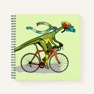 Ein Anabisetia Dinosaurier, der mit dem Fahrrad fä Notizbuch