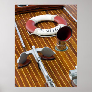 Ein Anker und ein Rettungsschwimmer auf einem Holz Poster