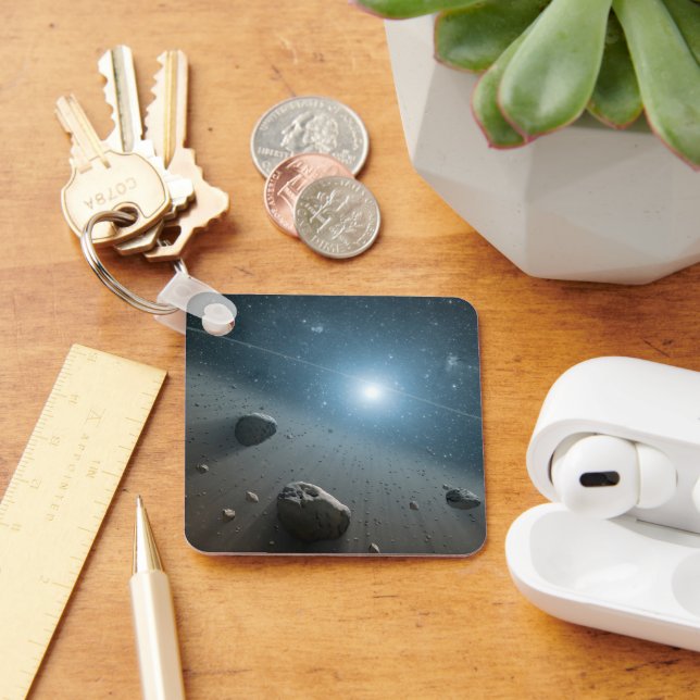 Ein Asteroidengürtel rund um den hellen Star Vega. Schlüsselanhänger (Schreibtisch)