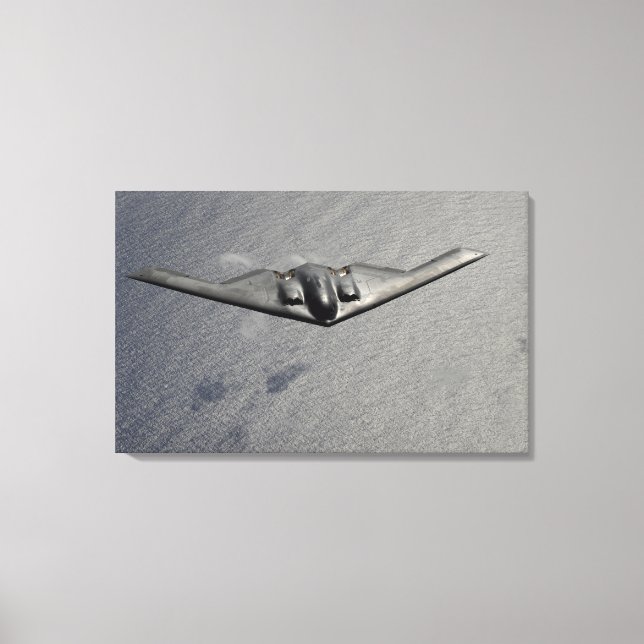 Ein B-2 Spirit fliegt über den Pazifik Leinwanddruck (Vorderseite)