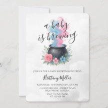 Ein Baby braut rosa und blaue Kessel