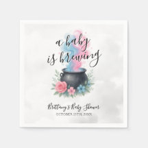 Ein Baby braut rosa und blaue Kessel