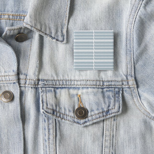 ein blau-weißes Muster mit weißem Hintergrund Button (Beispiel)