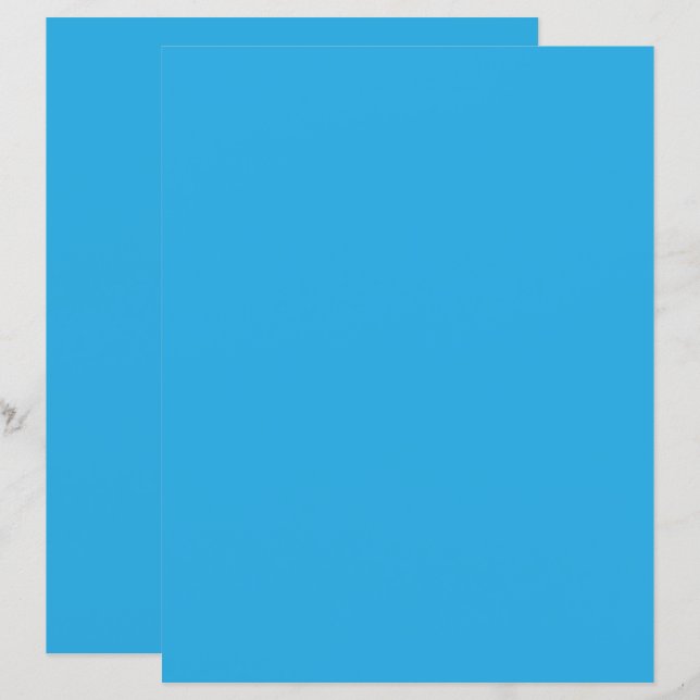 ein blauer Hintergrund mit einer schwarz-weißen Ka (Vorne/Hinten)