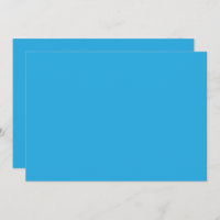 ein blauer Hintergrund mit einer schwarz-weißen Ka