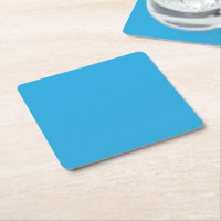 ein blauer Hintergrund mit einer schwarz-weißen Ka