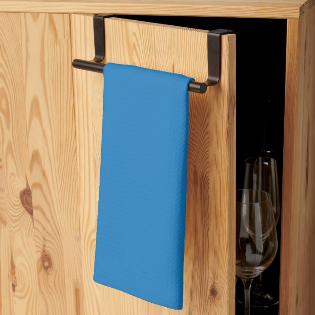 ein blauer Hintergrund mit Geschirrtuch (Drittel gefaltet)