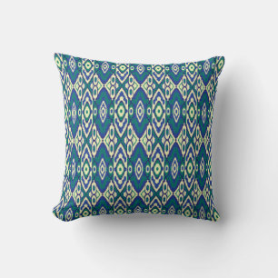 ein blaues und grünes Muster mit weißem Hintergrun Kissen