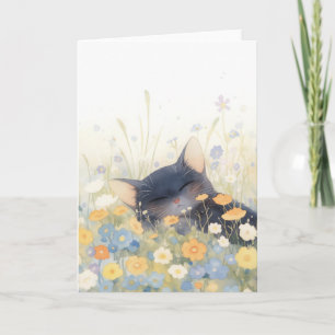 Ein Blumenbett mit Kätzchen Karte